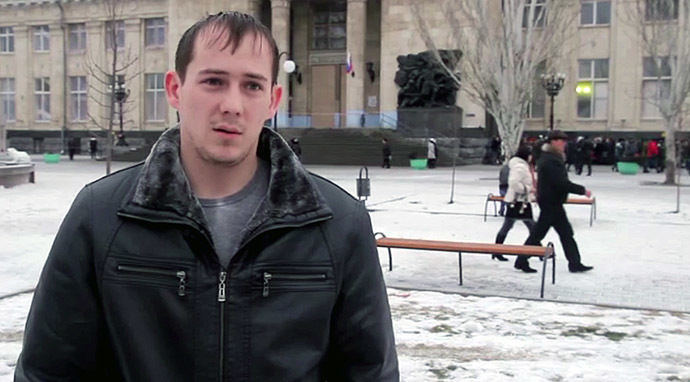 Yury Frisler, a 22-year-old worker at Volgograd railway station, who helped people following the December bombing (Still from RT video)