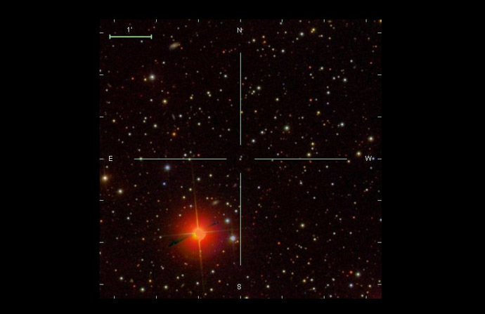 Image of hypervelocity star shown in red on the galaxy views. (Sloan Digital Sky Survey)