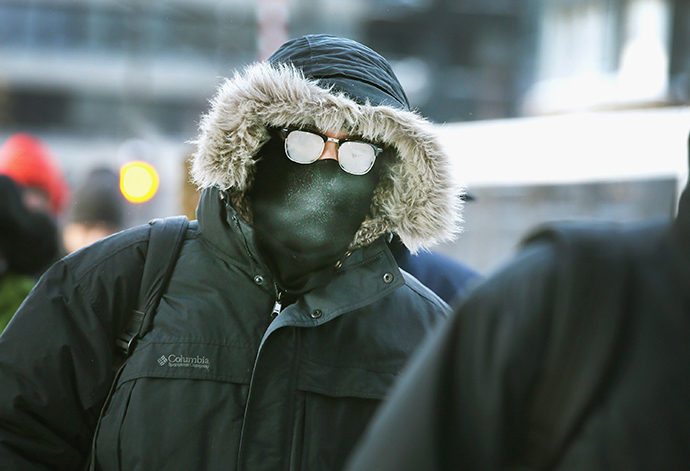 Commuters make a sub-zero trek to offices in the Loop on January 6, 2014 in Chicago, Illinois. (AFP Photo / Getty Images / Scott Olson)