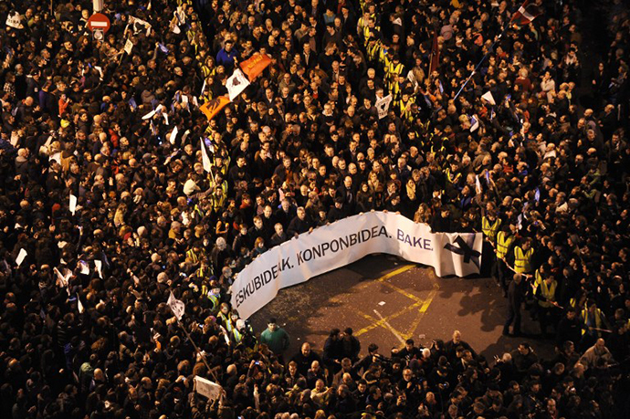 People march during a demonstration called by several Basque political parties, trade unions and social groups in the northern Spanish Basque city of Bilbao on January 11, 2014. (AFP Photo / Rafa Rivas)