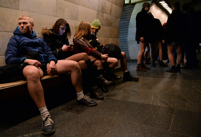 People in underwear wait for a train in the Kiev subway as they take part in the 2014 No Pants Subway Ride on January 12, 2014 (AFP Photo / Vasily Maximov)