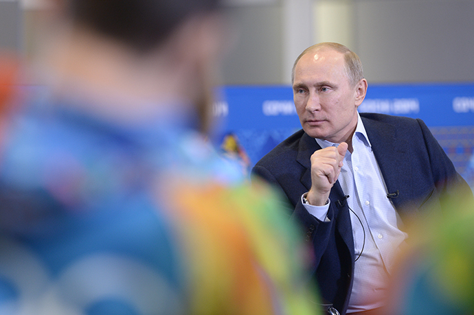 January 17, 2014. President Vladimir Putin meets with the volunteers taking part in preparing and holding the 22nd Winter Olympic Games and 11th Winter Paralympic Games in Sochi. (RIA Novosti / Aleksey Nikolskyi)