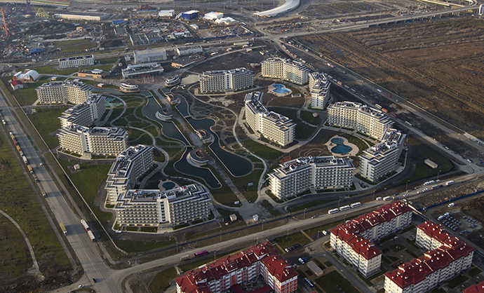 An aerial view from a helicopter shows hotels and residential houses recently constructed for the 2014 Winter Olympics in the Adler district of the Black Sea resort city of Sochi, December 23, 2013. (Reuters / Maxim Shemetov)