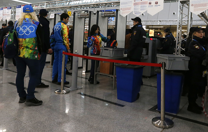 Police officers work at a checkpoint inside a train station in the Adler district of Sochi January 17, 2014. (Reuters / Alexander Demianchuk)