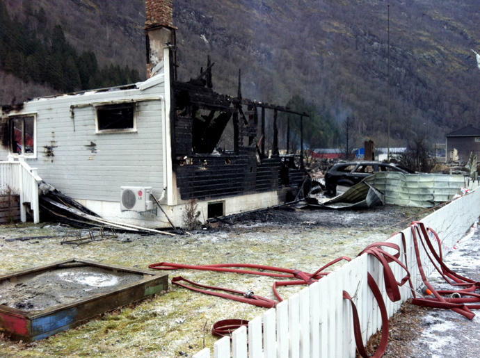 Burnt debris of a house are pictured at the site where a fire destroyed many of the famed 18th- and 19th-century wooden houses in the village Laerdal, southern Norway, on January 19, 2014. (AFP Photo / NTB / Marit Hommedal Norway out)