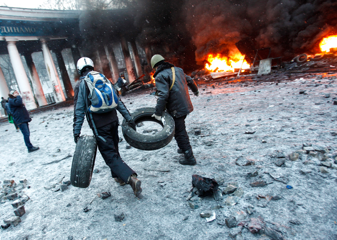 Riot policemen during clashes with protesters outside Dynamo stadium in Kiev. (RIA Novosti / Andrey Stenin) 