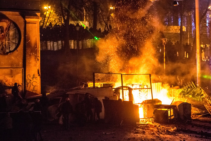 Fires burn during major clashes of protesters with law enforcement officials at Dynamo stadium in Kiev. (RIA Novosti/Andrey Stenin)