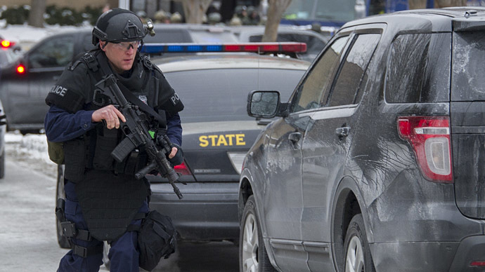Maryland State Police patrol the Columbia Mall after a fatal shooting on January 25, 2014, in Columbia, Maryland. (AFP Photo/Jim Watson)