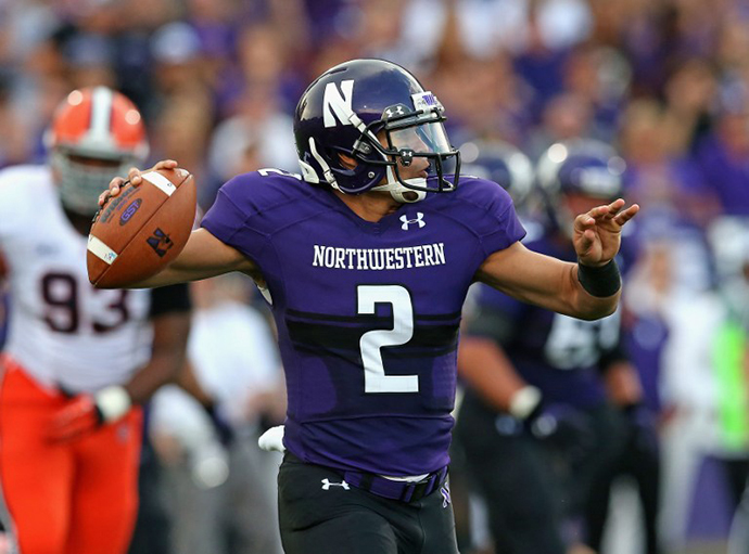 Kain Colter #2 of the Northwestern Wildcats passes against the Syracuse Orange at Ryan Field on September 7, 2013 in Evanston, Illinois. (AFP Photo / Getty Images / Jonathan Daniel)