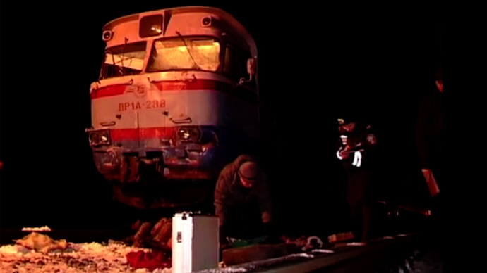 13 killed as commuter train rips apart shuttle bus on crossing in Ukraine