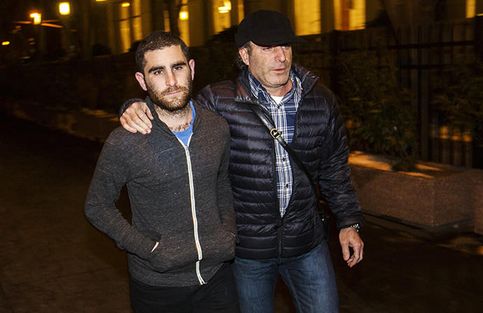 Bitcoin Foundation Vice Chairman Charlie Shrem (L) leaves the Manhattan Federal Courthouse in New York January 27, 2014. Shrem has been charged by U.S. prosecutors with conspiring to commit money laundering by helping to funnel cash to illicit online drugs bazaar Silk Road. (Reuters / Lucas Jackson)