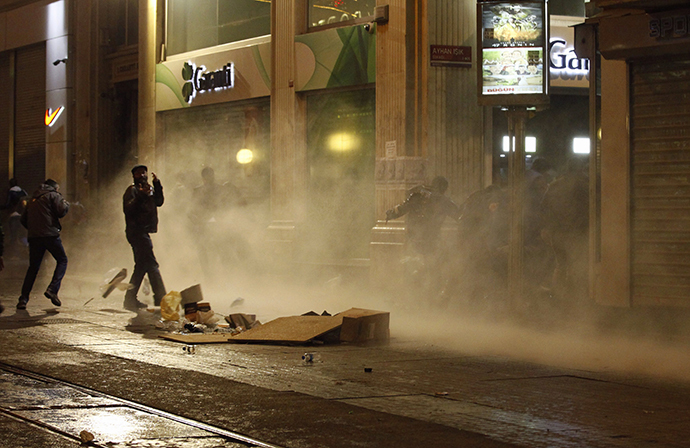 Riot police use a water cannon to disperse demonstrators during a protest against internet censorship in Istanbul January 18, 2014. (Reuters / Osman Orsal)