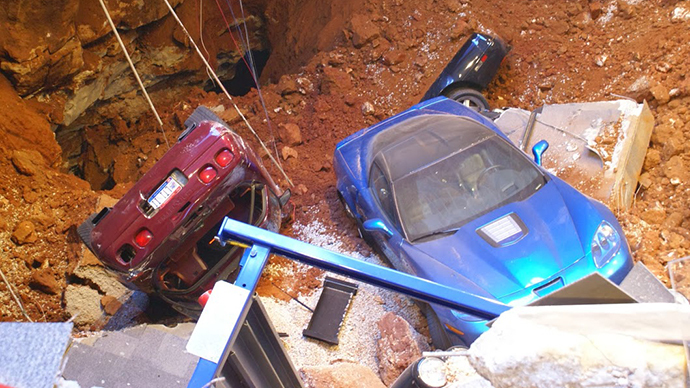 Sinkhole-swallowed Corvettes may take weeks to be retrieved from beneath Kentucky museum