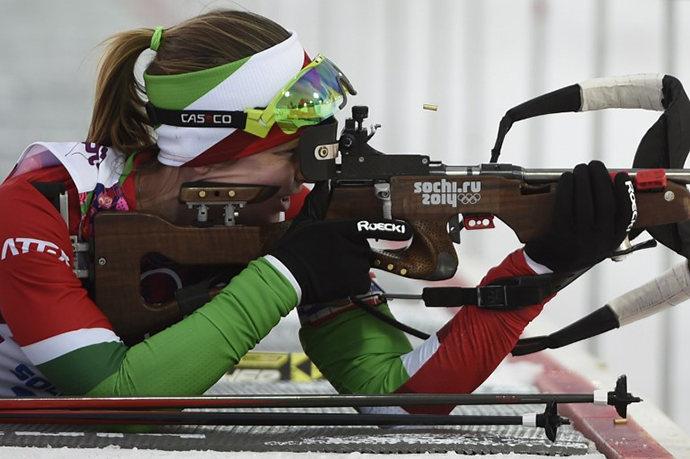 Belarus' Darya Domracheva competes at the firing range in the Women's Biathlon 15 km Individual at the Laura Cross-Country Ski and Biathlon Center during the Sochi Winter Olympics on February 14, 2014 in Rosa Khutor near Sochi. (AFP Photo / Odd Andersen)