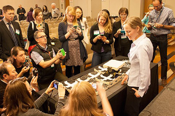Kirstin Petersen demonstrates termite-inspired robots at an annual meeting news briefing (Image credit: AAAS/Janel Kiley)