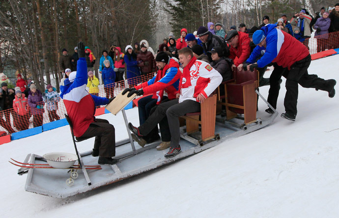 Russian athlete Alexander Tretyakov (2nd R, 2nd row), the winner of men's skeleton competition at the Bobsleigh and Skeleton World Championships 2013 in St. Moritz (Reuters / Ilya Naymushin)