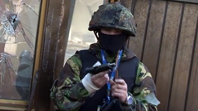 Armed rioter on the streets of Kiev on February 18.(Screenshot from YouTube video uploaded by Ukraine's Interior Ministry)