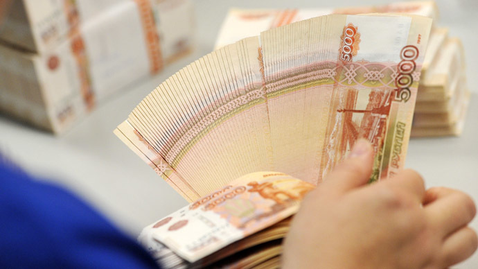 Sliding ruble to drag Russian economy into recession
