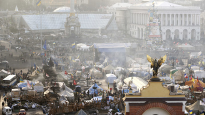 Ukrainian parliament votes to strip Yanukovich of powers as president leaves Kiev
