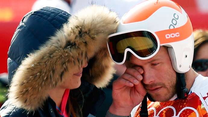 Third-placed Bode Miller (R) of the U.S. cries after the men's alpine skiing Super-G competition during the 2014 Sochi Winter Olympics at the Rosa Khutor Alpine Cente February 16, 2014. (Reuters / Mike Segar)