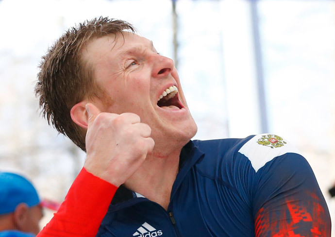 First placed Russia's pilot Alexander Zubkov celebrates after the four-man bobsleigh event of the Sochi 2014 Winter Olympic Games at the Sanki Sliding Center in Rosa Khutor February 23, 2014. (Reuters / Arnd Wiegmann)