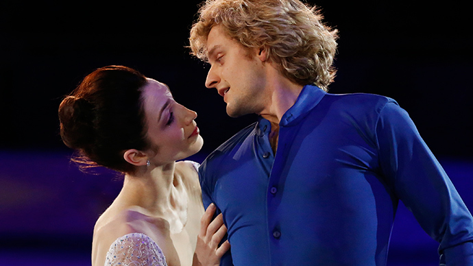 Meryl Davis and Charlie White of the U.S. perform during the Figure Skating Gala Exhibition at the Sochi 2014 Winter Olympics, February 22, 2014 (Reuters / Lucy Nicholson)