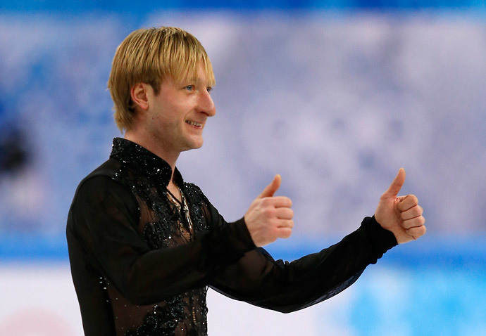 Russia's Yevgeni Plushenko celebrates after performing in the Men's Figure Skating Team Free Program at the Iceberg Skating Palace during the Sochi Winter Olympics on February 9, 2014. (AFP Photo / Adrian Dennis)