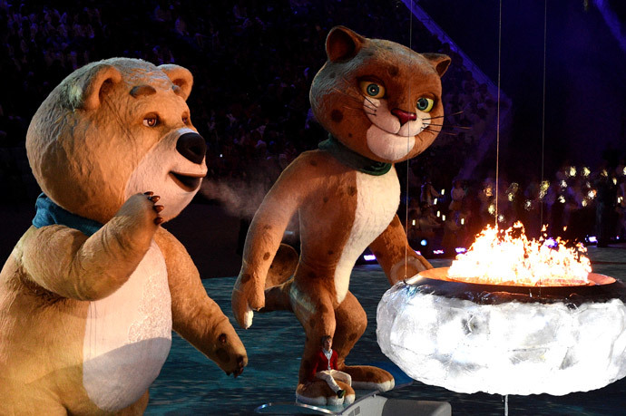 The polar bear mascot extinguishes the Olympic Flame during the Closing Ceremony of the Sochi Winter Olympics at the Fisht Olympic Stadium on February 23, 2014. (AFP Photo / Andrej Isakovic)