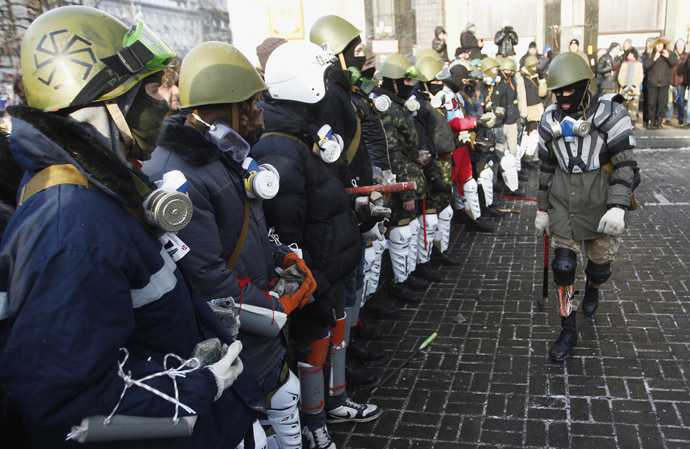 Far-right group "Right Sector" train in Independence Square in central Kiev, January 25, 2014. (Reuters/David Mdzinarishvili)