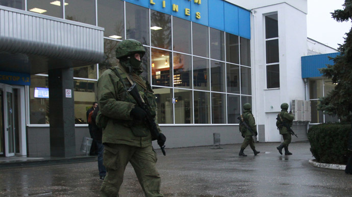 'No takeover' at Crimean capital’s airport, ‘self-defense squads’ on ...