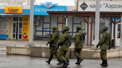 Crimean self-defense squads in stand off with Ukrainian soldiers at Belbek airport