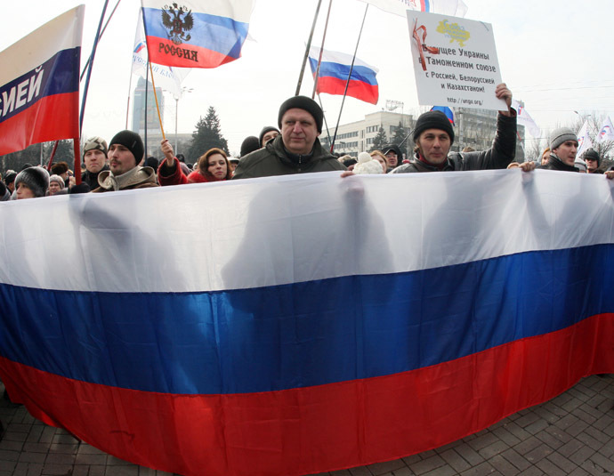 Pro-Russian protesters wave Russian flags during a rally in the industrial Ukrainian city of Donetsk on March 1, 2014. (AFP Photo/Alexander Khudoteply)