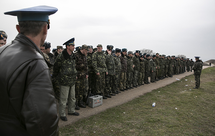 Ukrainian servicemen wait at Belbek Airport in Crimea on March 4, 2014. (Reuters / Baz Ratner)