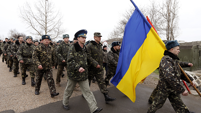 Crimean self-defense squads in stand off with Ukrainian soldiers at Belbek airport