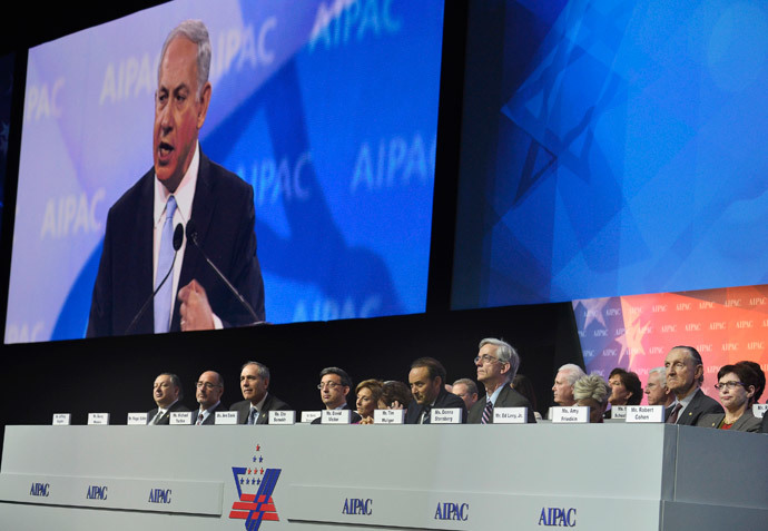 Israeli Prime Minister Benjamin Netanyahu (on the monitor) addresses the American Israel Public Affairs Committee (AIPAC), as board members listen, in Washington, March 4, 2014.(Reuters / Mike Theiler)