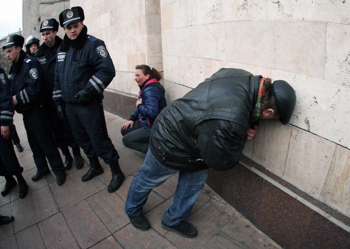  Pro-Russian protesters recover from their injuries after clashes with police as they stormed a regional state administration building in the eastern Ukrainian city of Donetsk on March 5, 2014. (AFP Photo / Alexander Khudoteply)