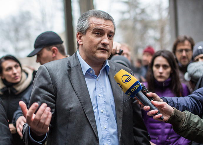 Sergey Aksyonov, chairman of the Crimean Council of Ministers, near Crimean parliament on February 28, 2014. (RIA Novosti / Andrey Stenin)