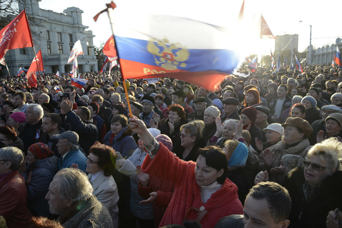 Pro-Russian demonstrators take part in a rally in the Crimean town of Yevpatoria March 5, 2014. (Reuters/Maks Levin)