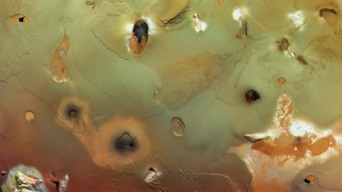 Collapsed volcanoes form large, dark spots on Ioâs surface (Image courtesy of NASA/JPL/University of Arizona)