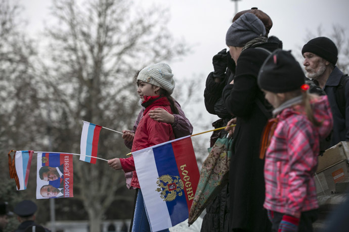 Pro-Russia supporters attend a rally in the Crimean port city of Sevastopol March 8, 2014.(Reuters / Baz Ratner)
