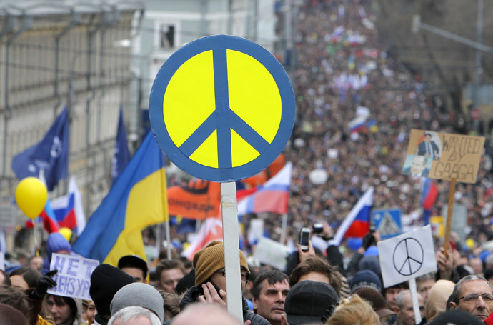 People take part in an anti-war procession and a rally in Moscow March 15, 2014. (Reuters/Maxim Shemetov)