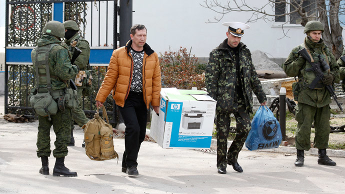 Ukrainian servicemen leave Navy base in Sevastopol as Crimea protesters storm HQ