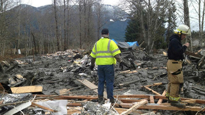 Rescuers face dangerous toxins in Washington state mudslide recovery operation