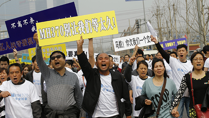 'Have you no shame?'  Grief-stricken families of MH370 passengers protest in China