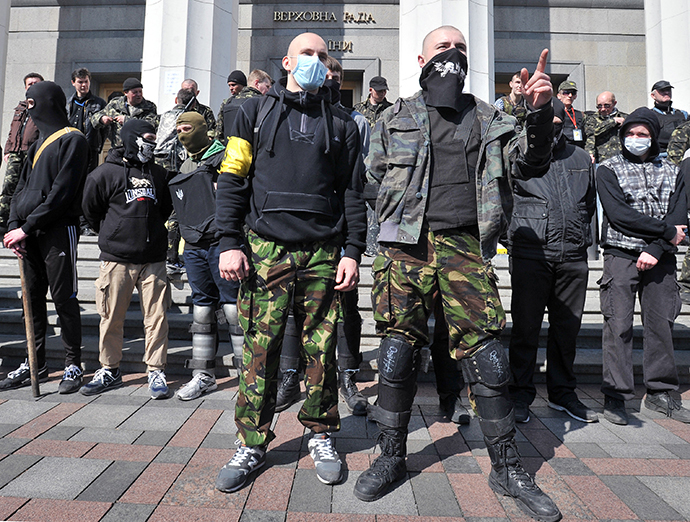Supporters of the right wing party Pravyi Sector (Right Sector) protest in front of the Ukrainian Parliament in Kiev on March 28, 2014. (AFP Photo / Ganya Savilov)