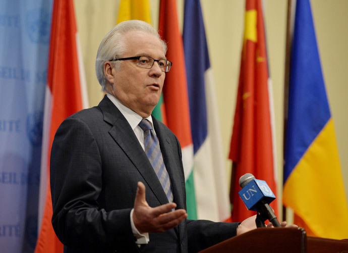 Vitaly Churkin, Russia's Ambassador to the United Nations, speaks to the media after a closed-door session of the Security Council to discuss the situation in Ukraine March 28, 2014 at UN headquarters in New York.(AFP Photo / Stan Honda)
