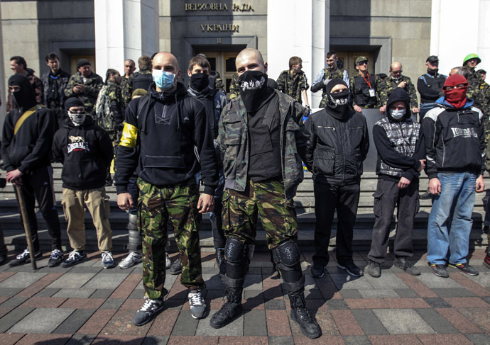 Members of the Ukrainian far-right radical group Right Sector stand outside the parliament in Kiev March 28, 2014. (Reuters/Valentyn Ogirenko)
