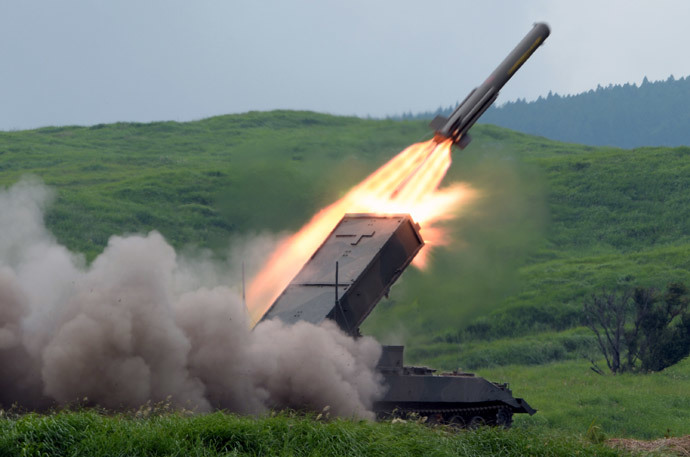 Japanese Ground Self-Defense Forces type-92 anti-mine rocket launcher fires a missile during an annual live fire exercise at the Higashi-Fuji firing range in Gotemba, at the foot of Mt. Fuji in Shizuoka prefecture (AFP Photo / Toshifumi Kitamura)