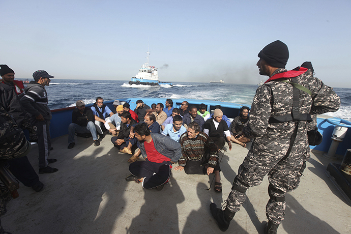 Crew members of the Morning Glory are brought to Tripoli port, March 23, 2014. (Reuters / Hani Amara)