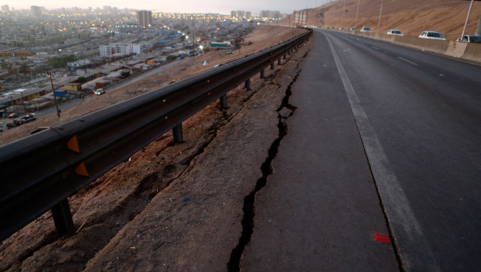 A view of a damaged road to Alto Hospicio commune after an earthquake and tsunami hit the northern port of Iquique April 2, 2014. (Reuters / Ivan Alvarado) 